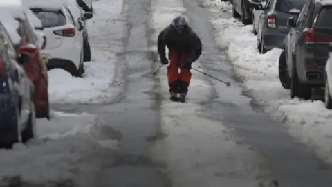 Skier on a street