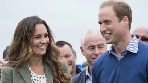 Mark Cuthbert/Getty Images Catherine, then Duchess of Cambridge, and Prince William, then Duke of Cambridge, start The Ring O'Fire Anglesey Coastal Ultra Marathon in 2013