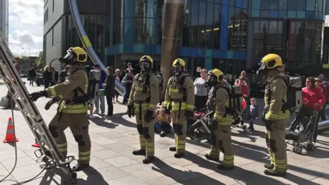Huw Jakeway South Wales Fire and Rescue Service firefighters take part in the ladder climb