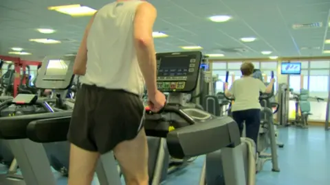 Man running on treadmill