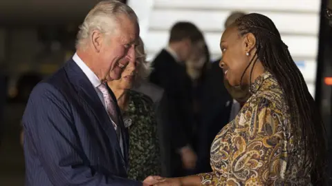 PA Media The Prince of Wales, accompanied by the Duchess of Cornwall, met Special Advisor Ambassador Yamina Kritanyi