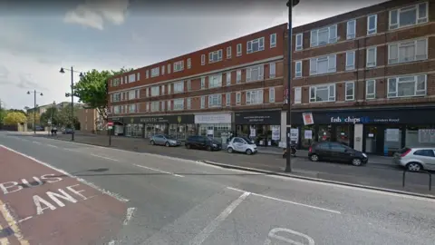 Google London Road at the junction with Essex Road, Enfield