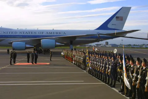 Getty Images An honour guard greets Air Force One on the Moscow tarmac in 2002