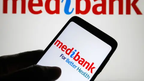 Getty Images The Medibank Private Limited logo is seen displayed on a smartphone screen