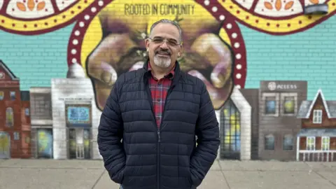 Brandon Drenon/ The BBC Khalid Turaani poses for a photo