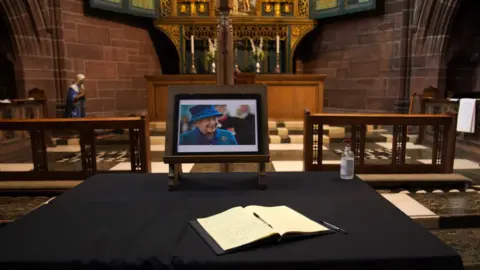 PA Media A book of condolence at Liverpool Cathedral following the death of Queen Elizabeth II