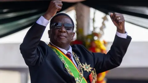 Getty Images Zimbabwe's President Emmerson Mnangagwa dances as he celebrates after being inaugurated in Harare, Zimbabwe - September 2023