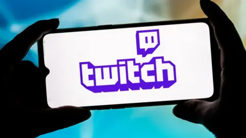 Getty Images Twitch logo on a phone