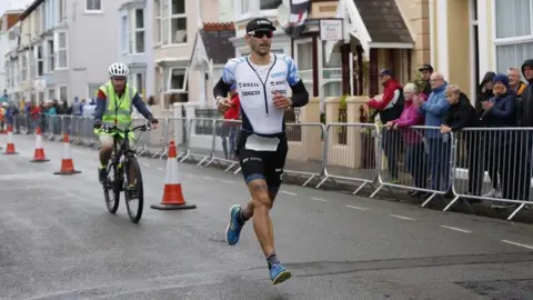 Huw Fairclough/Ironman Athletes have to complete a 2.4 mile swim, a 112 mile bike ride and a 26 mile run
