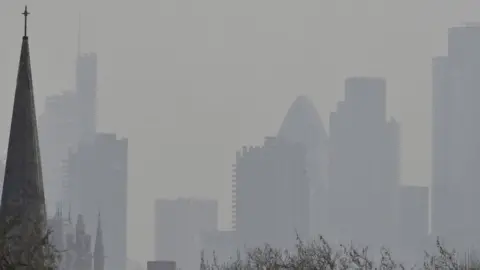 Reuters City of London financial district is seen from Primrose Hill as high air pollution obscures the skyline over London