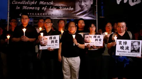 Reuters Activists' vigil in Hong Kong