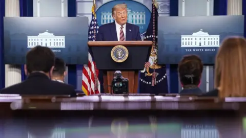 Getty Images President Trump speaks to press