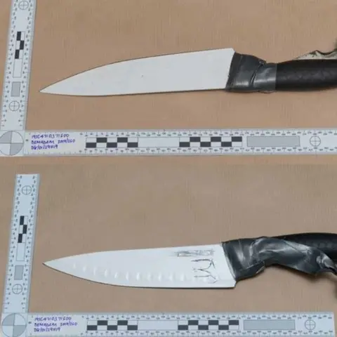 Metropolitan Police kitchen knives bought by Khan in the days leading up to the Fishmongers" Hall terror attack, with the remnants of some duct tape about the handles which he used to secure the knives to his gloves