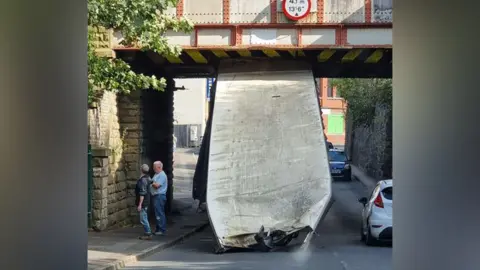 Wayne McNeill Lorry under bridge at Church and Oswaldtwistle railway station