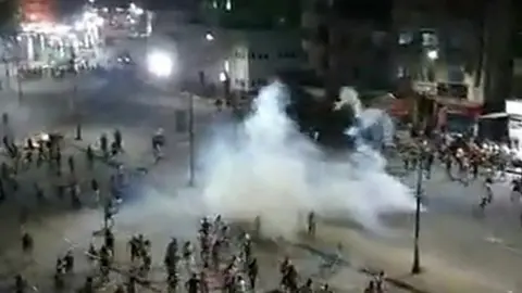 AFP Screengrab of video purportedly showing confrontation between protesters and security forces in Arbaeen Square, Suez, Egypt on 21 September 2019