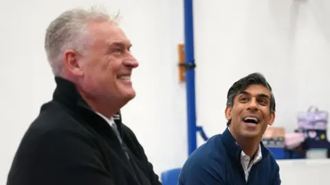 PA Media Lee Anderson and Rishi Sunak