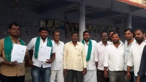 BBC Telugu Farmers in Nizamabad photographed after filing their election nomination papers.