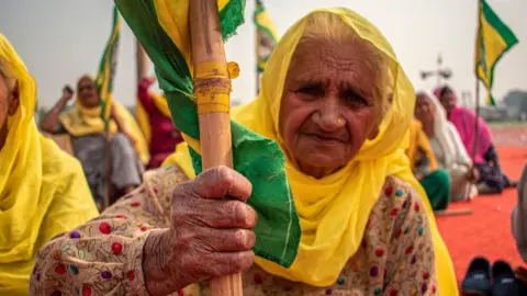 Getty Images Farmers gather to mark the first anniversary of their protest against the controversial farm laws on the outskirts of Delhi