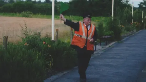 David Hardy Geoff Clark signalling a train