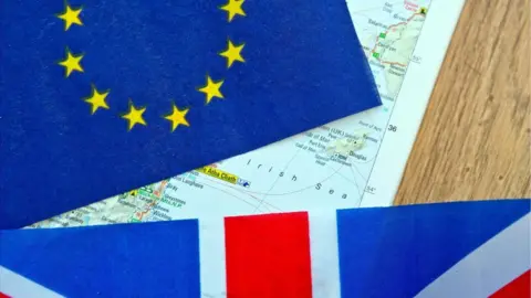 Getty Images Image of the Irish Sea on a map with a union jack and Euro flag