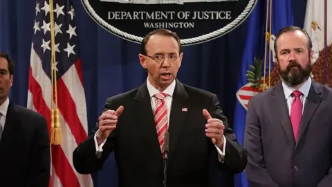 Getty Images Rod Rosenstein unveils the latest round of indictments from the special counsel office.