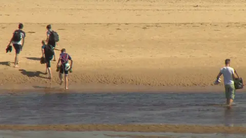 Members of the public had wading across the River Lossie to reach East Beach