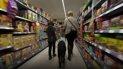 Alex with his autism dog