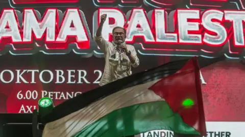 EPA Malaysian PM Anwar Ibrahim at pro-Palestinian rally