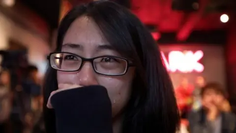 Reuters A same-sex marriage supporter in Taiwan cries after Saturday's referendums in Taiwan. Photo: 24 November 2018