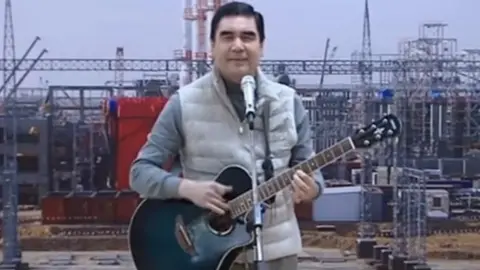 TURKMEN TV ALTYN ASYR President Berdymukhamedov singing and playing the guitar