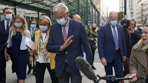 EPA Michel Barnier holds up his hand to reporters as he leaves the Westminster Conference Centre for the next round of Brexit talks, on 10 September 2020