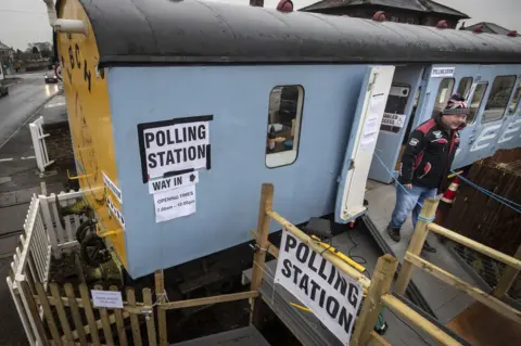 PA Media Railway carriage as polling station