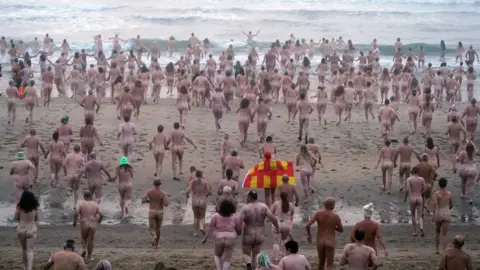 PA Media Druridge Bay skinny dip