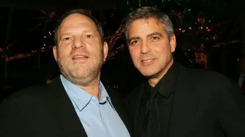 Getty Images George Clooney with Harvey Weinstein at the National Board Of Review Of Motion Pictures Awards.