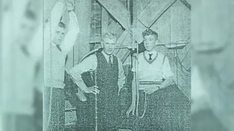 Robin Pittman Robin Pittman and two other men ringing bells