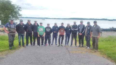 Trout Anglers' Federation of Ireland TAFI's award-winning Ulster youth team, with their trophy and coaches