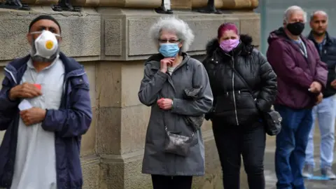 AFP queue of people in Lancashire