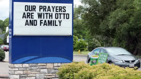 EPA A restaurant shows its support for Otto Warmbier in Wyoming, Ohio near Cincinnati, USA, with a sign saying its prayers are with "Otto and family"