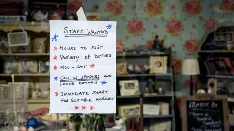 Getty Images A job advert in a shop window