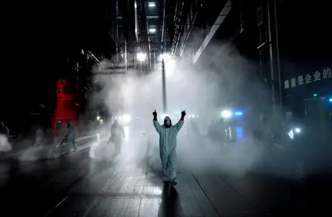 Reuters Volunteers disinfect the Qintai Grand Theatre in Wuhan
