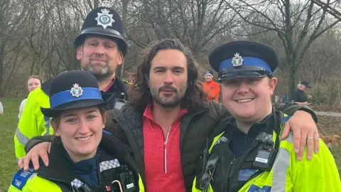 Joe Wicks with police officers