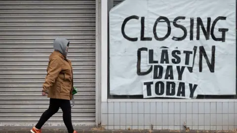 Getty Images Closing down shop sign