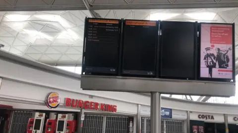 BBC Stansted Airport arrivals board