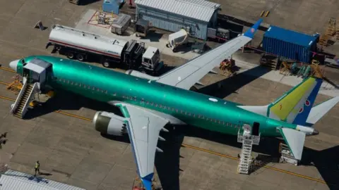 Getty Images Boeing 737 Max Planes Sit Idle As Company Continues To Work On Software Glitch That Contributed To Two Fatal Jetliner Crashes.