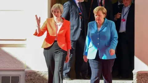 AFP/Getty Images Theresa May and Angela Merkel in Salzburg, September 2018