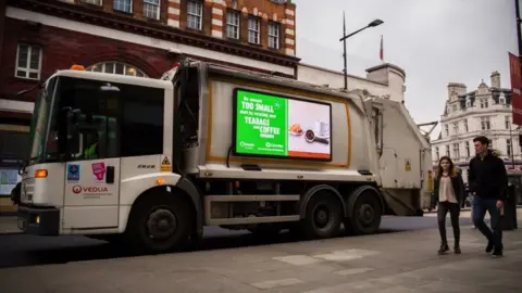 Inurface Inurface advertising screen on bin lorry