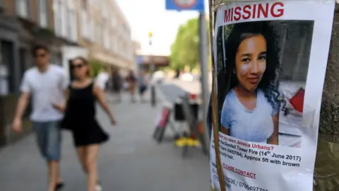 PAUL ELLIS An image of missing persion Jessica Urbano, is pictured near to the Grenfell Tower fire