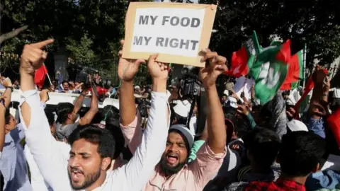 EPA Demonstrators protest against the decision to ban the purchase and sale of cattle from animal markets for slaughter in Bangalore, India (02 June 2017)