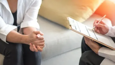 Getty Images Patient with psychiatrist