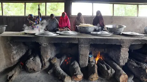 Reuters Women cook in the kitchen in Yerwa girls school in Maiduguri, Nigeria July 18, 2017.